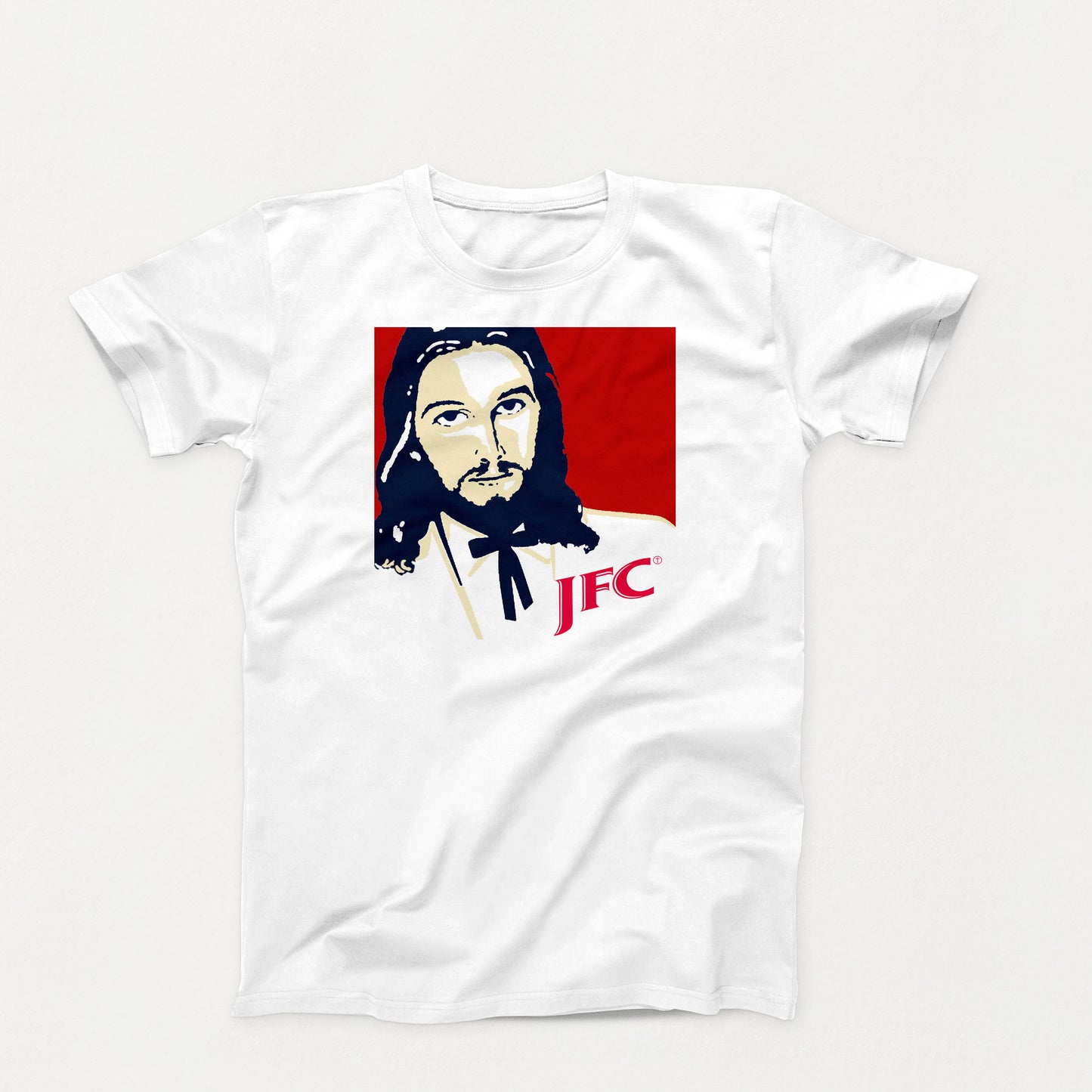 White t-shirt with parody logo featuring Jesus styled like Colonel Sanders, labeled “JFC” in red letters