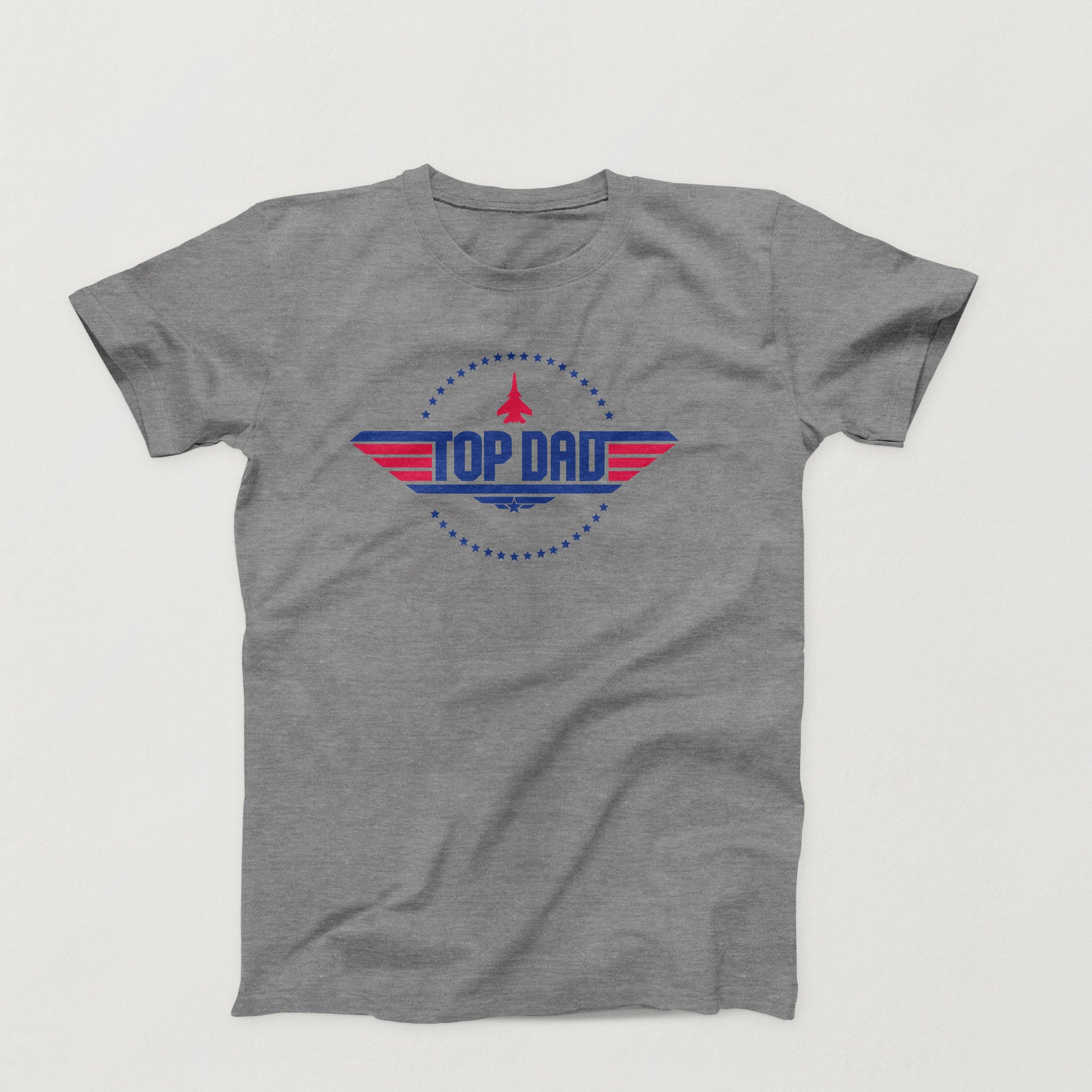 Top Dad shirt design with retro fighter jet, patriotic stars, and bold red and blue text inspired by Top Gun style on a gray tee