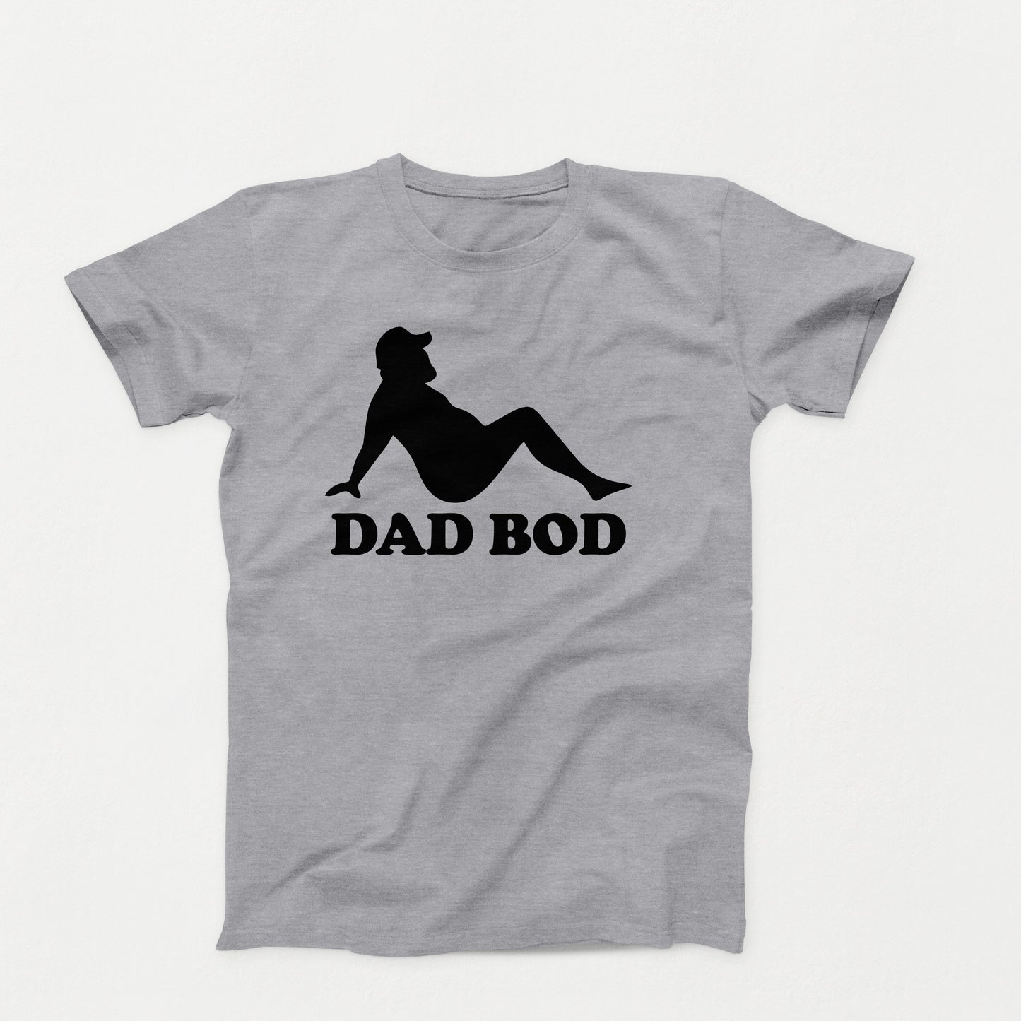 black silhouette of a relaxed bearded man in a cap with the words “Dad Bod” below on a grayshirt design