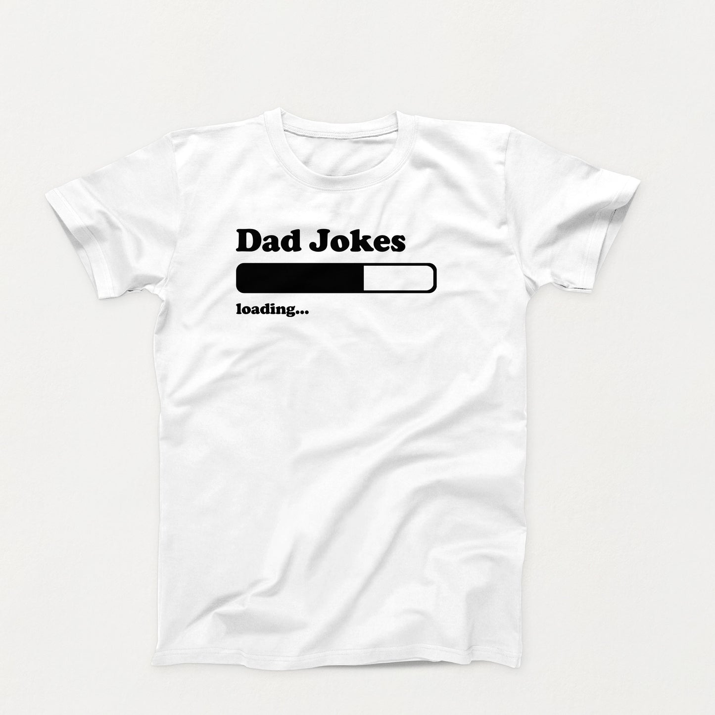 white shirt design with text that reads “Dad Jokes Loading…” and a black progress bar graphic