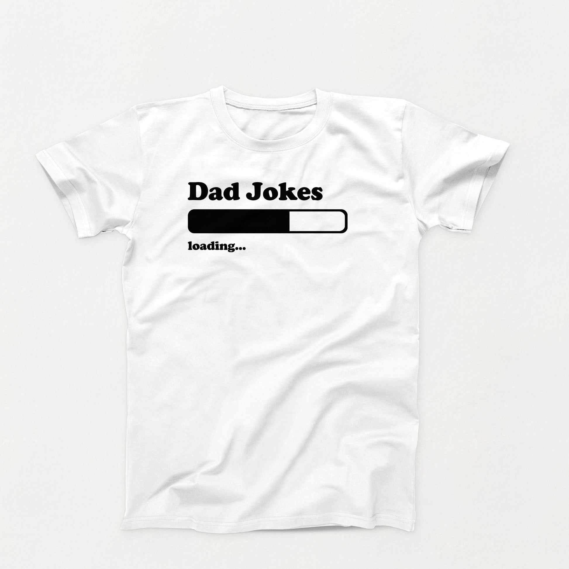 white shirt design with text that reads “Dad Jokes Loading…” and a black progress bar graphic