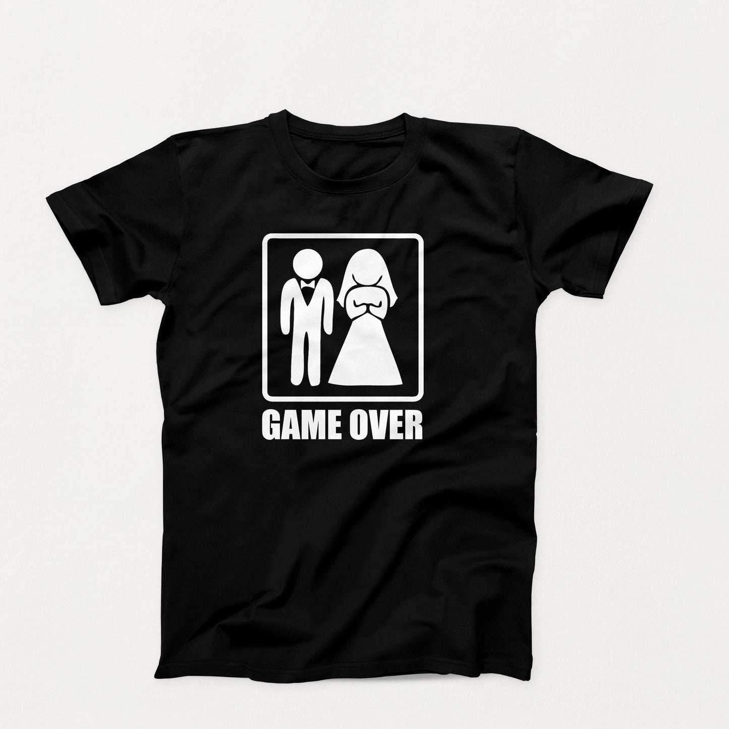 Funny black wedding shirt with white silhouette of a groom and bride above the words “Game Over” in bold block letters