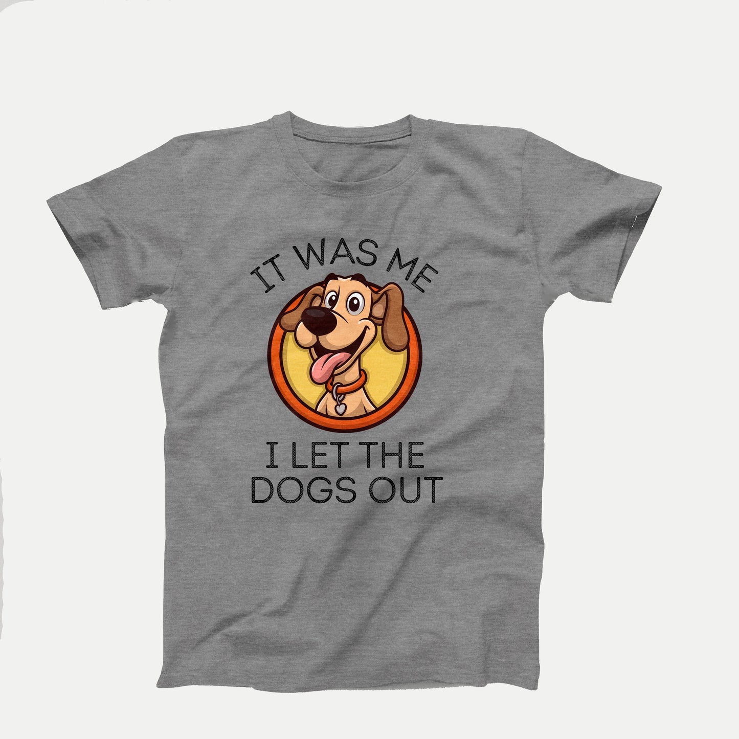 Cute cartoon dog with text that reads “It Was Me – I Let the Dogs Out” on a gray shirt design
