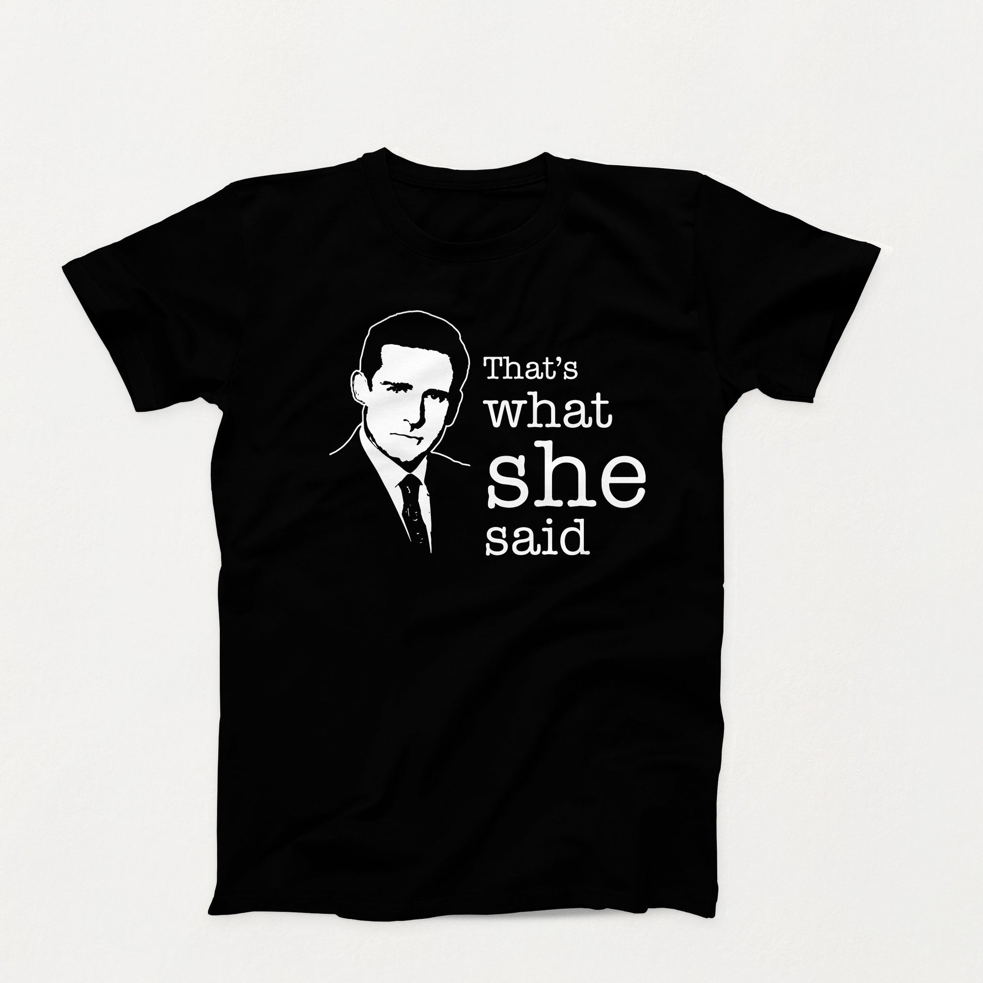 Black and white shirt design with a silhouette of a man in a suit and the phrase “That’s What She Said” in bold typewriter font